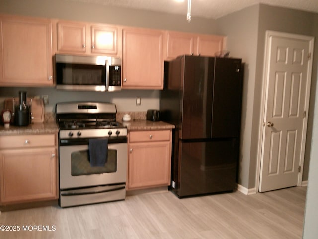 25 Watson Ct, Howell, NJ 07731 - kitchen featuring appliances with stainless steel finishes and light wood-style flooring