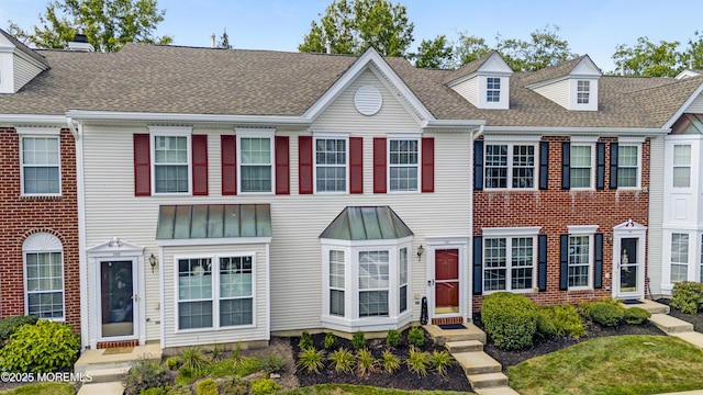 141 Setter Pl, Freehold, NJ 07728 - colonial home with roof with shingles and a standing seam roof