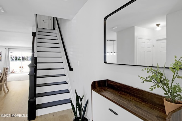 141 Setter Pl, Freehold, NJ 07728 - stairway featuring wood finished floors