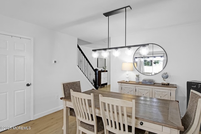 141 Setter Pl, Freehold, NJ 07728 - dining room with stairway and light wood-style floors