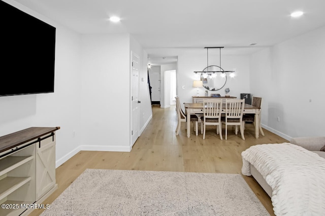 141 Setter Pl, Freehold, NJ 07728 - dining space with light wood finished floors, a chandelier, and recessed lighting