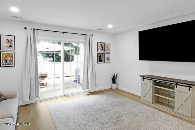 141 Setter Pl, Freehold, NJ 07728 - living area with light wood-style flooring and recessed lighting