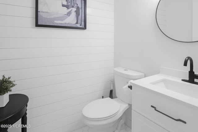 141 Setter Pl, Freehold, NJ 07728 - half bathroom featuring vanity and wooden walls