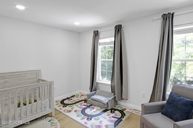 141 Setter Pl, Freehold, NJ 07728 - bedroom featuring multiple windows, wood finished floors, and recessed lighting