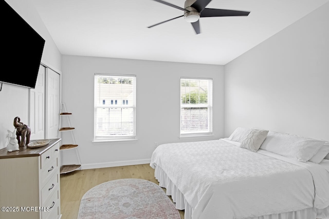 141 Setter Pl, Freehold, NJ 07728 - bedroom featuring light wood-style flooring, a ceiling fan, and a closet