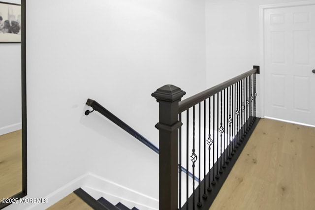 141 Setter Pl, Freehold, NJ 07728 - stairs featuring wood finished floors and baseboards