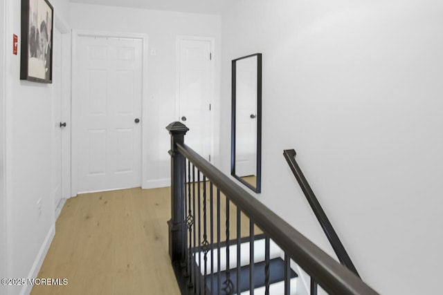 141 Setter Pl, Freehold, NJ 07728 - hall featuring an upstairs landing and light wood-style floors