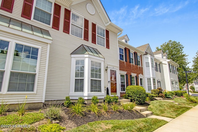 141 Setter Pl, Freehold, NJ 07728 - view of front of house with a residential view