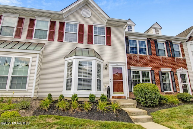 141 Setter Pl, Freehold, NJ 07728 - colonial-style house featuring a standing seam roof and a metal roof