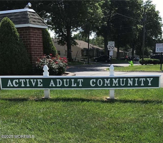 9 Maine Ct Unit 741, Matawan, NJ 07747 - community / neighborhood sign featuring a lawn
