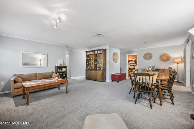 149 Idlewild Ln, Aberdeen, NJ 07747 - carpeted dining area featuring ornamental molding and baseboards