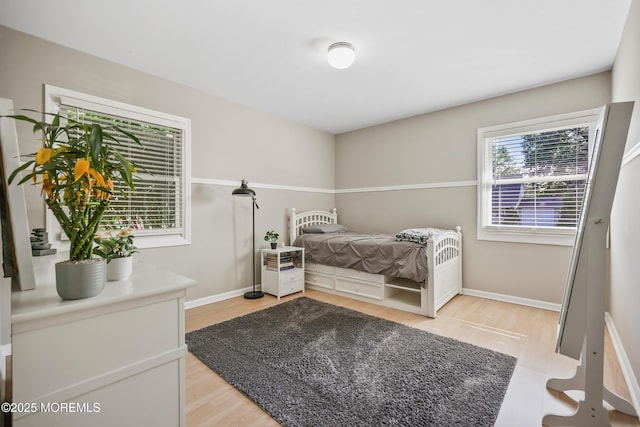 149 Idlewild Ln, Aberdeen, NJ 07747 - bedroom with light wood-type flooring and baseboards