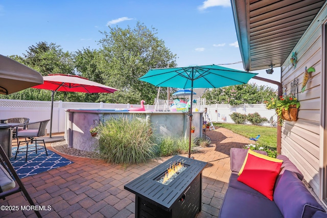 149 Idlewild Ln, Aberdeen, NJ 07747 - fenced backyard featuring a patio, an outdoor fire pit, and outdoor dining area