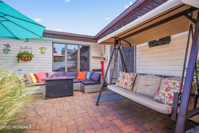 149 Idlewild Ln, Aberdeen, NJ 07747 - view of patio with an outdoor living space with a fire pit