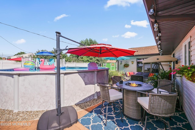 149 Idlewild Ln, Aberdeen, NJ 07747 - view of patio with an outdoor fire pit