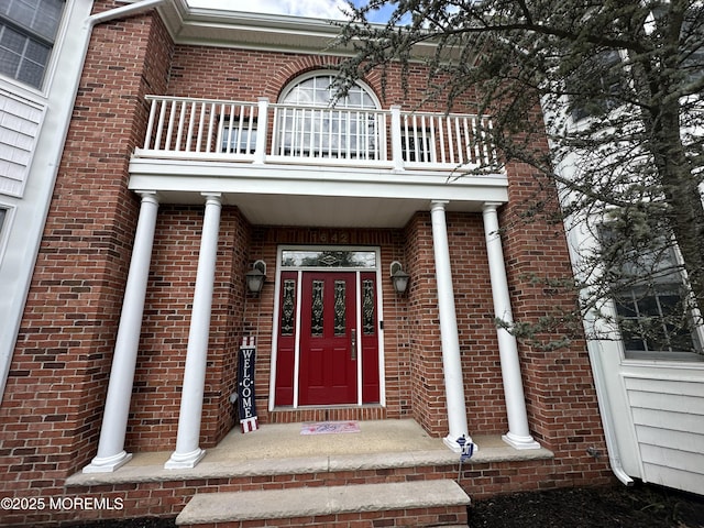 1642 Mink Ct, Toms River, NJ 08755 - doorway to property with a balcony and brick siding