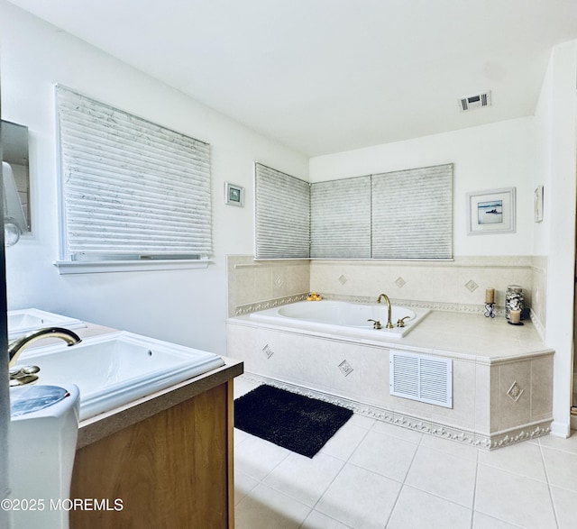 1642 Mink Ct, Toms River, NJ 08755 - bathroom featuring a garden tub, tile patterned floors, and vanity