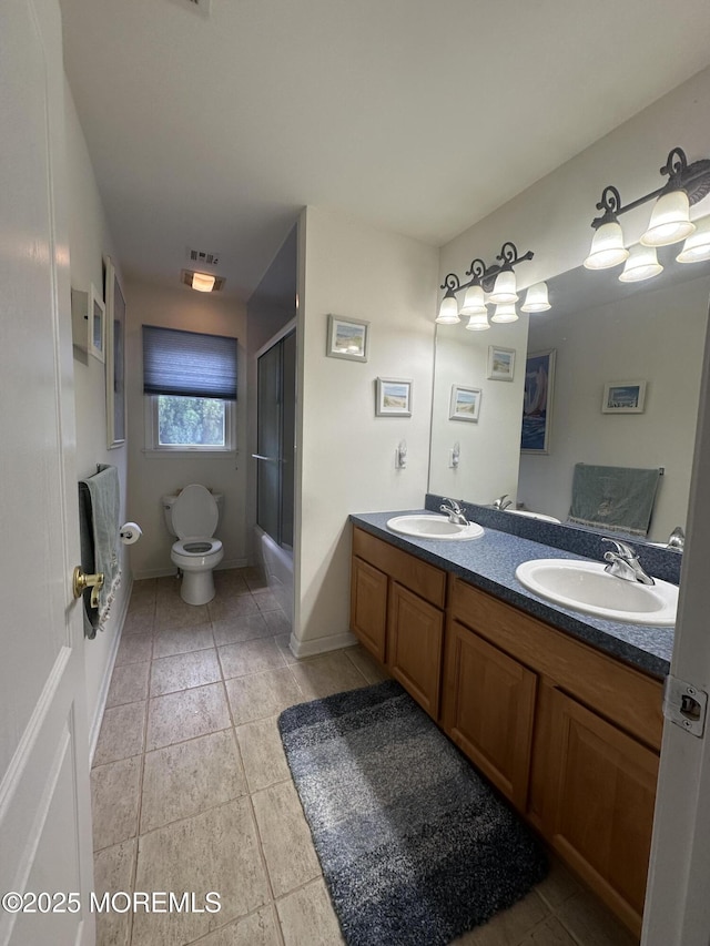1642 Mink Ct, Toms River, NJ 08755 - full bathroom with double vanity, shower / bath combination with glass door, and tile patterned flooring