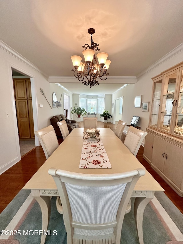 1642 Mink Ct, Toms River, NJ 08755 - dining area featuring dark wood-style floors, a chandelier, and ornamental molding