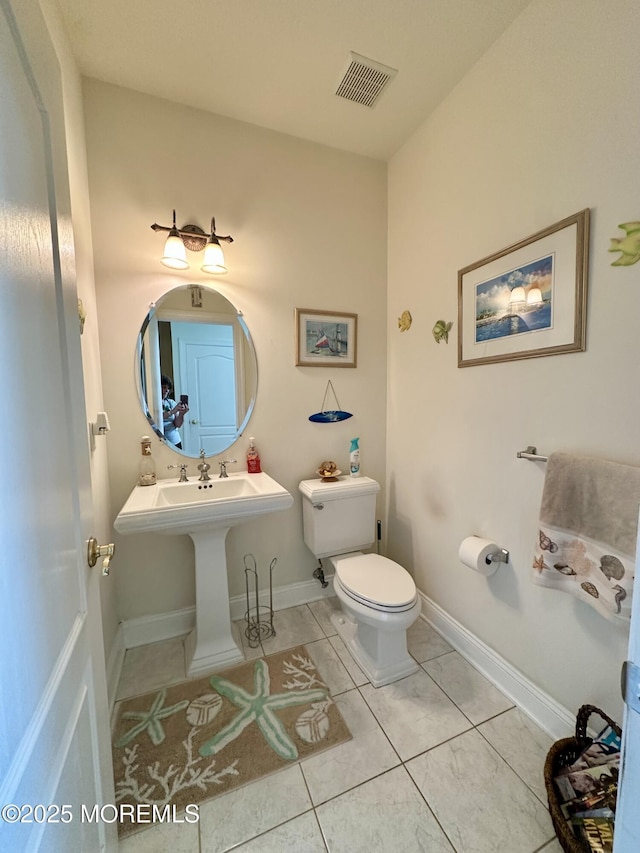 1642 Mink Ct, Toms River, NJ 08755 - half bath featuring toilet and tile patterned flooring