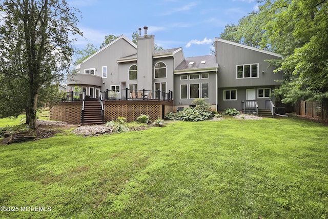 42 Nikki Ct, Morganville, NJ 07751 - rear view of house with stairs, a wooden deck, a chimney, and a shingled roof
