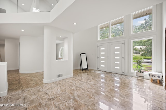 42 Nikki Ct, Morganville, NJ 07751 - entrance foyer featuring a high ceiling, marble tiled floors, and recessed lighting