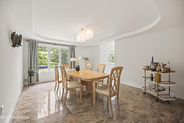 42 Nikki Ct, Morganville, NJ 07751 - dining area featuring baseboards and a raised ceiling