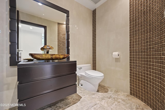 42 Nikki Ct, Morganville, NJ 07751 - bathroom with tile walls and vanity