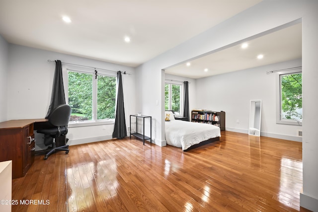 42 Nikki Ct, Morganville, NJ 07751 - bedroom featuring hardwood / wood-style floors, multiple windows, recessed lighting, and an office area