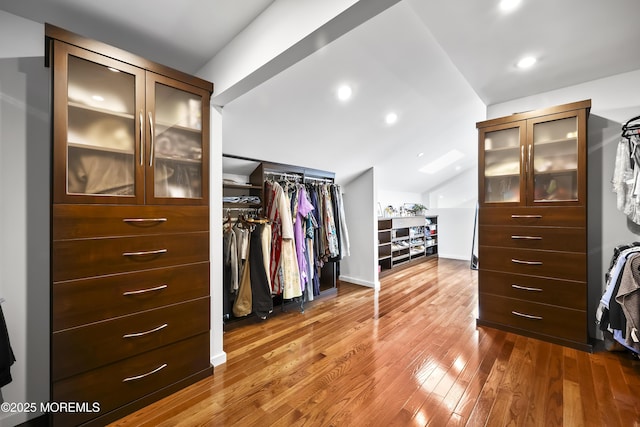 42 Nikki Ct, Morganville, NJ 07751 - spacious closet featuring vaulted ceiling and wood finished floors