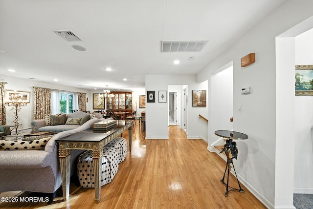 7 Stony Ridge Dr, Hillsdale, NJ 07642 - living room with light wood-type flooring, a chandelier, and recessed lighting