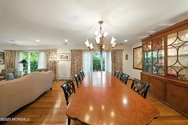 7 Stony Ridge Dr, Hillsdale, NJ 07642 - dining space featuring a chandelier, wood finished floors, recessed lighting, and a baseboard heating unit
