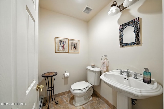7 Stony Ridge Dr, Hillsdale, NJ 07642 - half bathroom with baseboards and baseboard heating