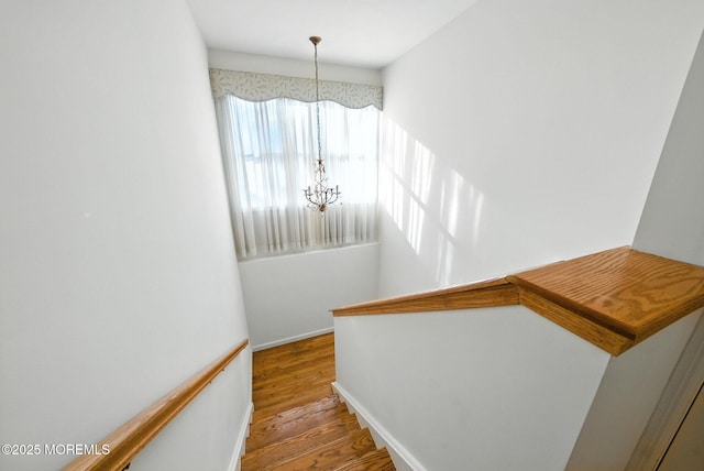 7 Stony Ridge Dr, Hillsdale, NJ 07642 - stairs with a chandelier and wood finished floors