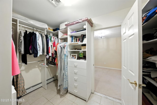 7 Stony Ridge Dr, Hillsdale, NJ 07642 - walk in closet featuring light tile patterned flooring and a baseboard heating unit