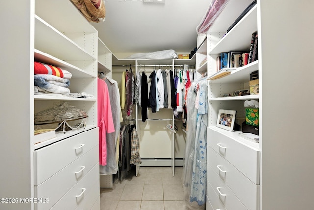 7 Stony Ridge Dr, Hillsdale, NJ 07642 - walk in closet with light tile patterned flooring and a baseboard heating unit