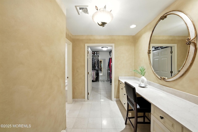 7 Stony Ridge Dr, Hillsdale, NJ 07642 - hallway with light tile patterned floors and a desk
