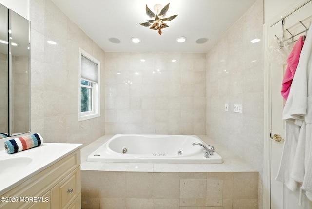 7 Stony Ridge Dr, Hillsdale, NJ 07642 - bathroom featuring vanity, a whirlpool tub, and tile walls