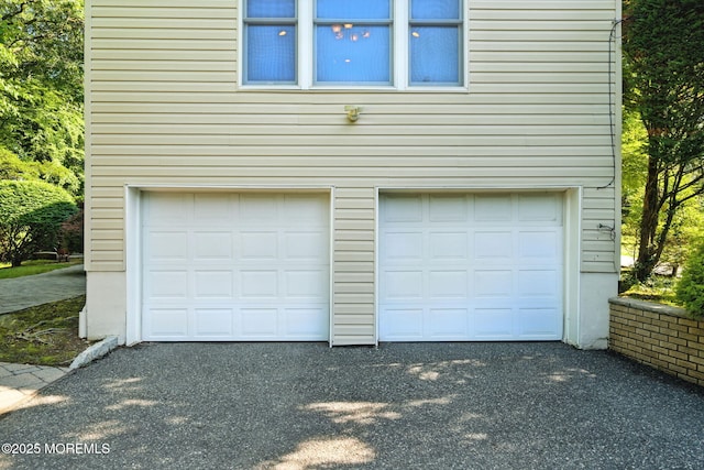 7 Stony Ridge Dr, Hillsdale, NJ 07642 - garage with asphalt driveway