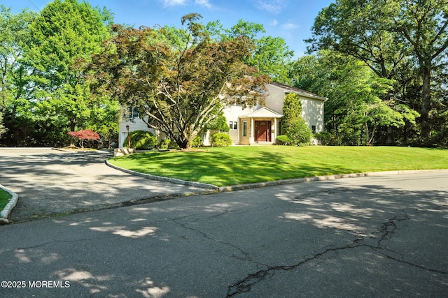 7 Stony Ridge Dr, Hillsdale, NJ 07642 - view of front facade featuring a front yard and asphalt driveway