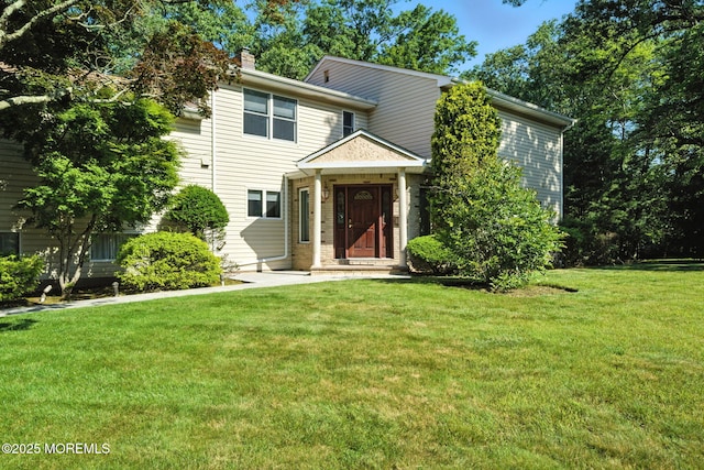 7 Stony Ridge Dr, Hillsdale, NJ 07642 - view of front of house featuring a front yard and a chimney
