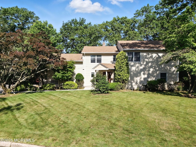 7 Stony Ridge Dr, Hillsdale, NJ 07642 - view of front facade with a front yard and a chimney