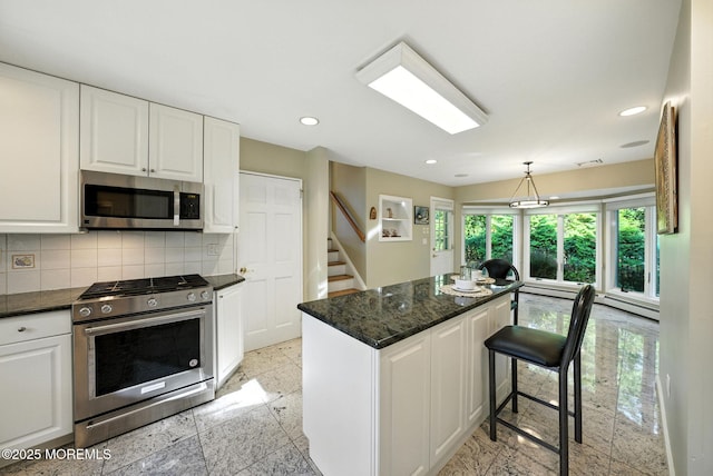 7 Stony Ridge Dr, Hillsdale, NJ 07642 - kitchen with appliances with stainless steel finishes, white cabinetry, and recessed lighting