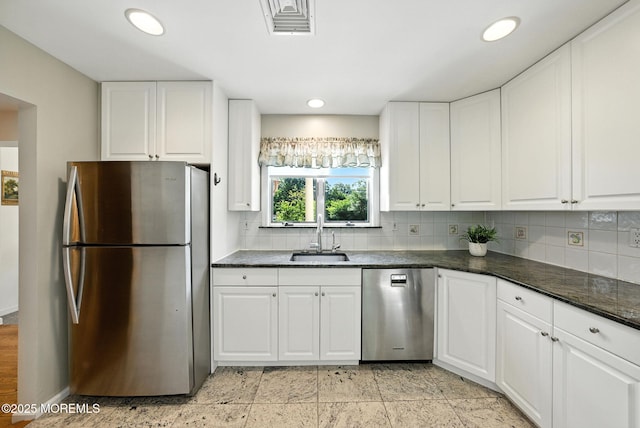 7 Stony Ridge Dr, Hillsdale, NJ 07642 - kitchen with stainless steel appliances, backsplash, white cabinetry, and recessed lighting
