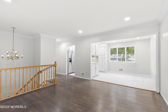 424 River Ter, Toms River, NJ 08755 - spare room featuring a chandelier, ornamental molding, light wood finished floors, and recessed lighting