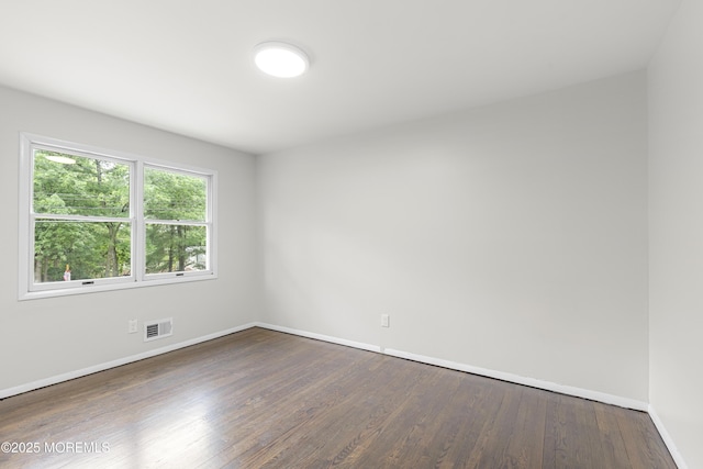 424 River Ter, Toms River, NJ 08755 - unfurnished room featuring baseboards and wood finished floors