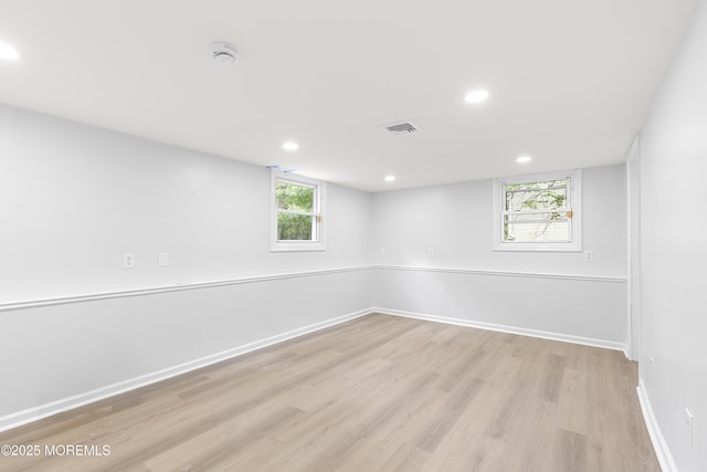 424 River Ter, Toms River, NJ 08755 - unfurnished room with wood finished floors, recessed lighting, healthy amount of natural light, and a smoke detector