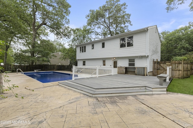 424 River Ter, Toms River, NJ 08755 - back of property featuring a deck, a fenced backyard, and a patio