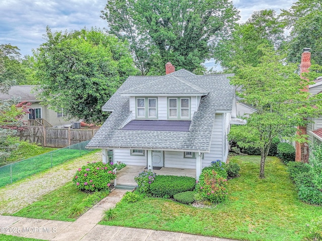 1416 Garven Ave, Ocean Twp, NJ 07712 - bungalow-style home featuring covered porch, a shingled roof, and a chimney