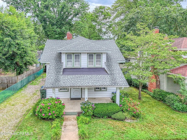 1416 Garven Ave, Ocean Twp, NJ 07712 - view of front of property featuring a shingled roof, covered porch, and a chimney